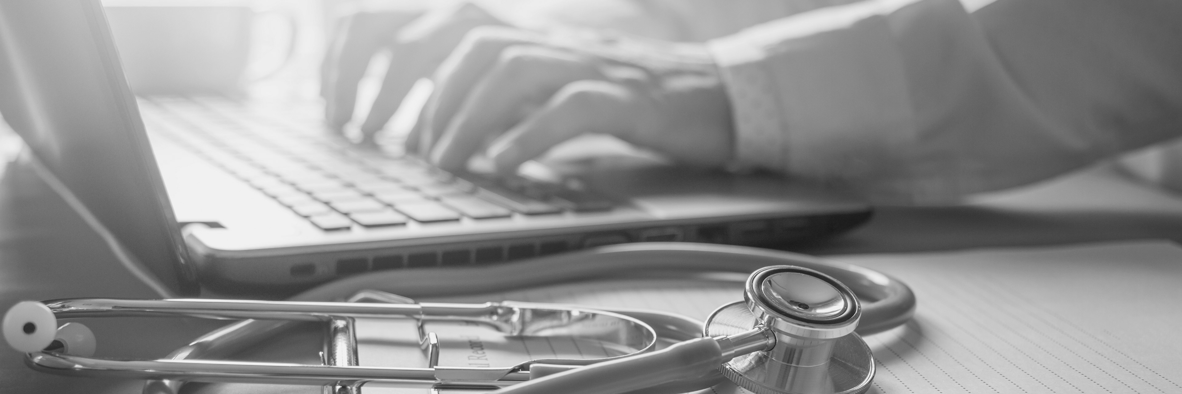doctor on computer